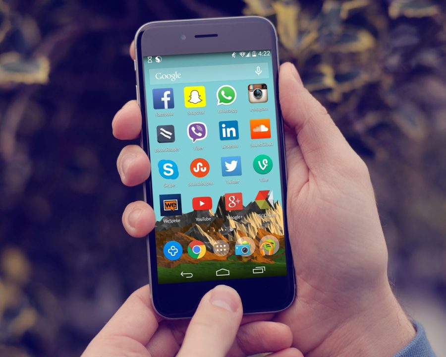 Social media app icons on a smartphone home screen